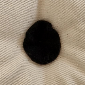 Schwarze Fleeceknöpfe